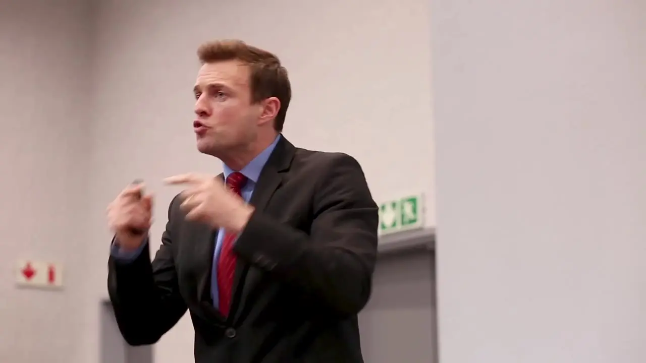 Jacques presenting on stage